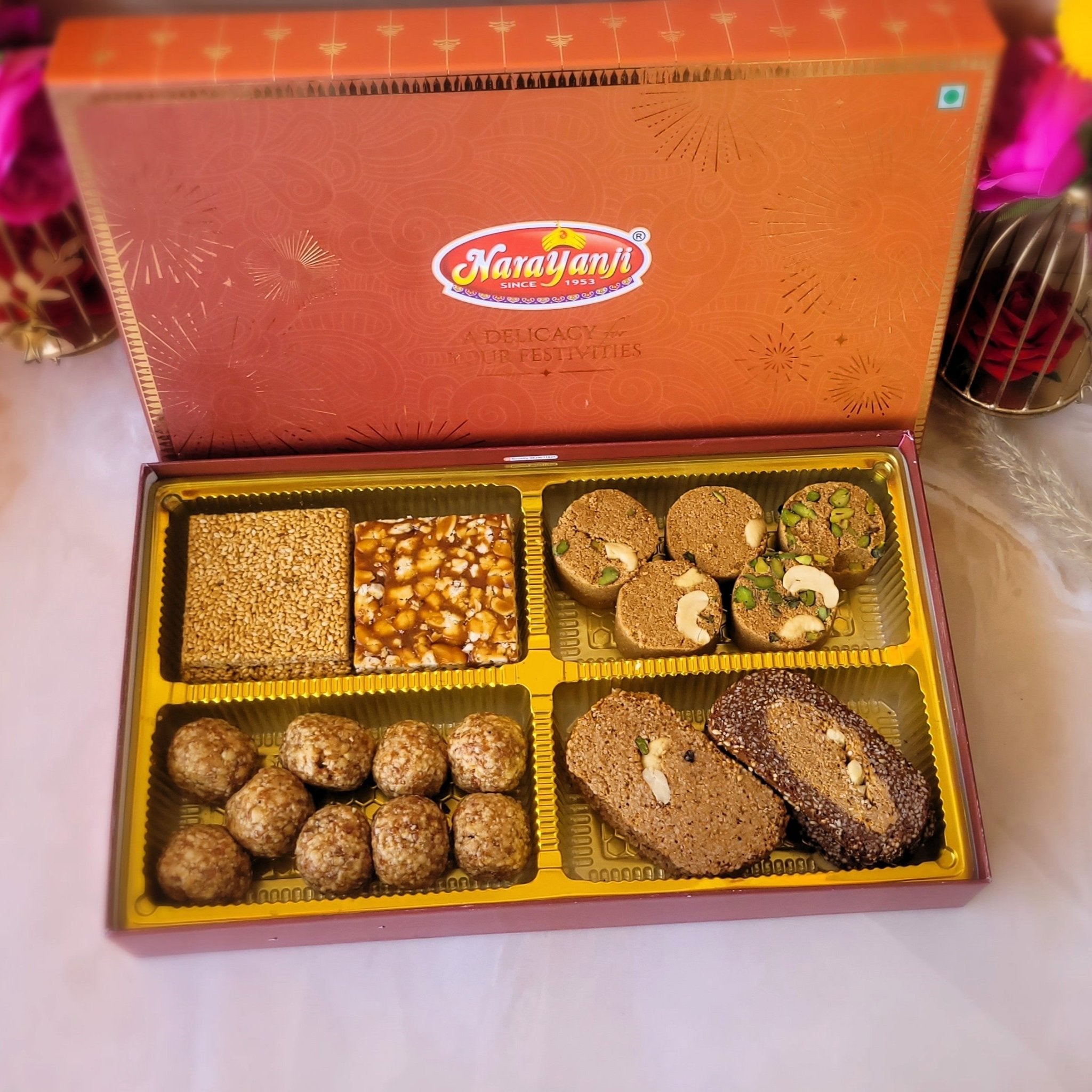 Online sweets n savory rakhi gift hamper with 1kg haldiram rasgulla to  Hyderabad, Express Delivery - HyderabadOnlineFlorists