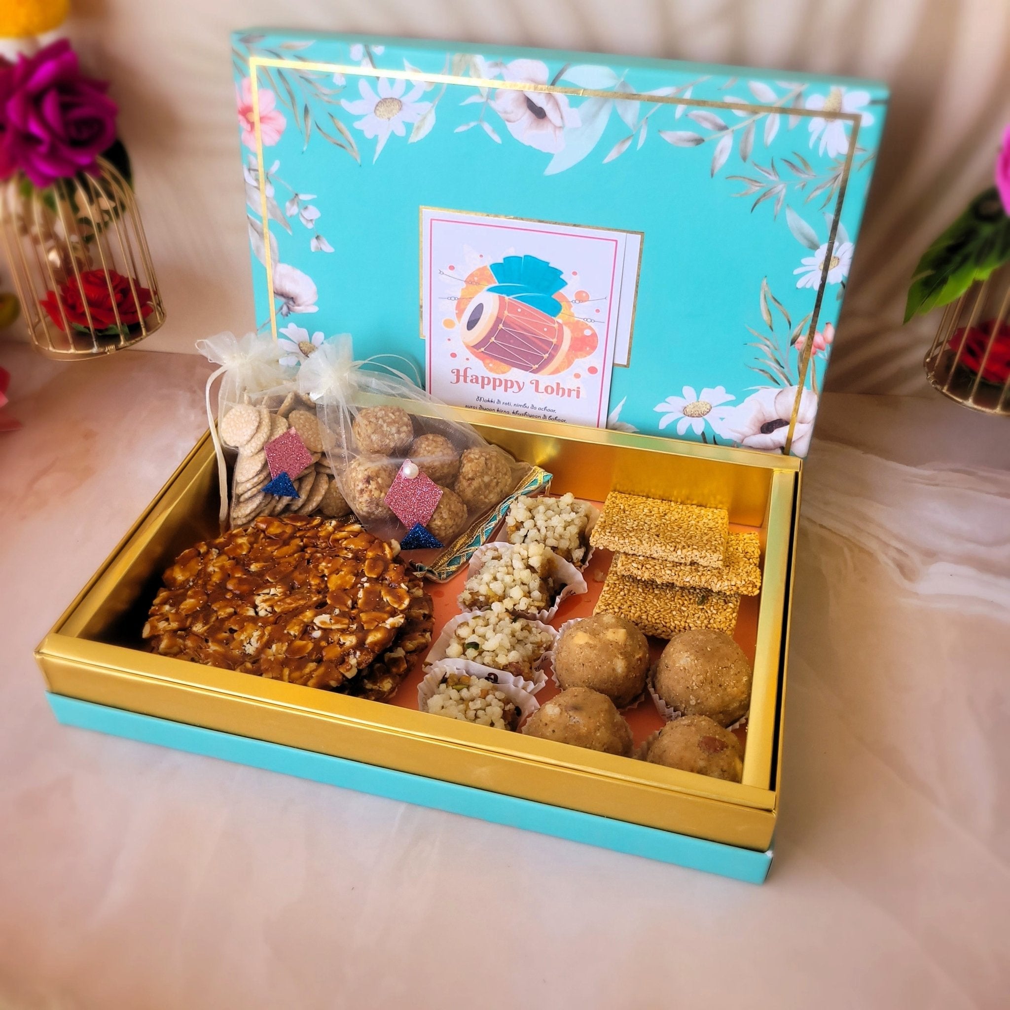 Buy Kesar Sweets | Lohri & Makar Sankranti Snacks & Sweets Gifting Hamper  Box - Gifts Pack with Sweet Fini, Peanut Chikki, Black Pepper Cashew,  Popcorn & Moongphali in Potli Online at Best Prices in India - JioMart.